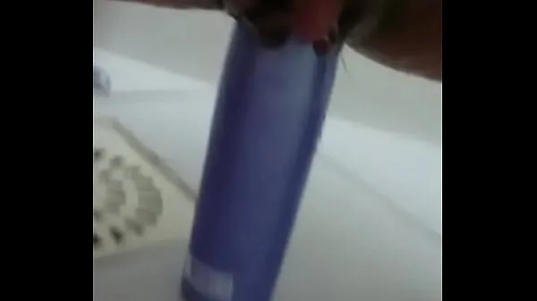 Big Stuffing the shampoo into the pussy and the growing clitoris total Clips